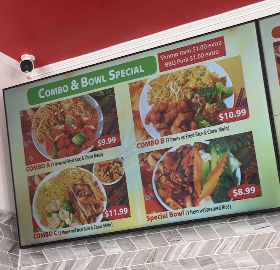 Printed menu with rice, noodles, and chicken dishes